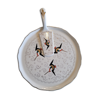 Plat et pelle à tarte en porcelaine motif cigogne, Longwy