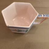 Hexagonal cup signed Henriot HR Quimper 7. Good condition.