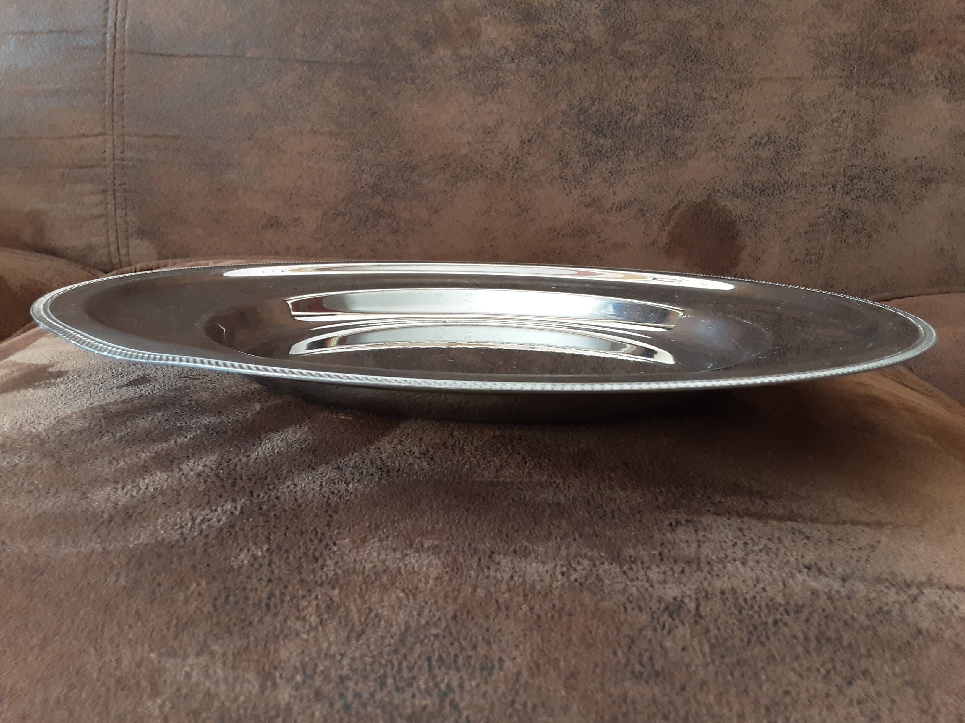Vintage metal round plate