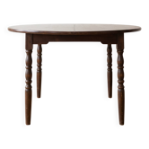 Traditional round wooden dining table