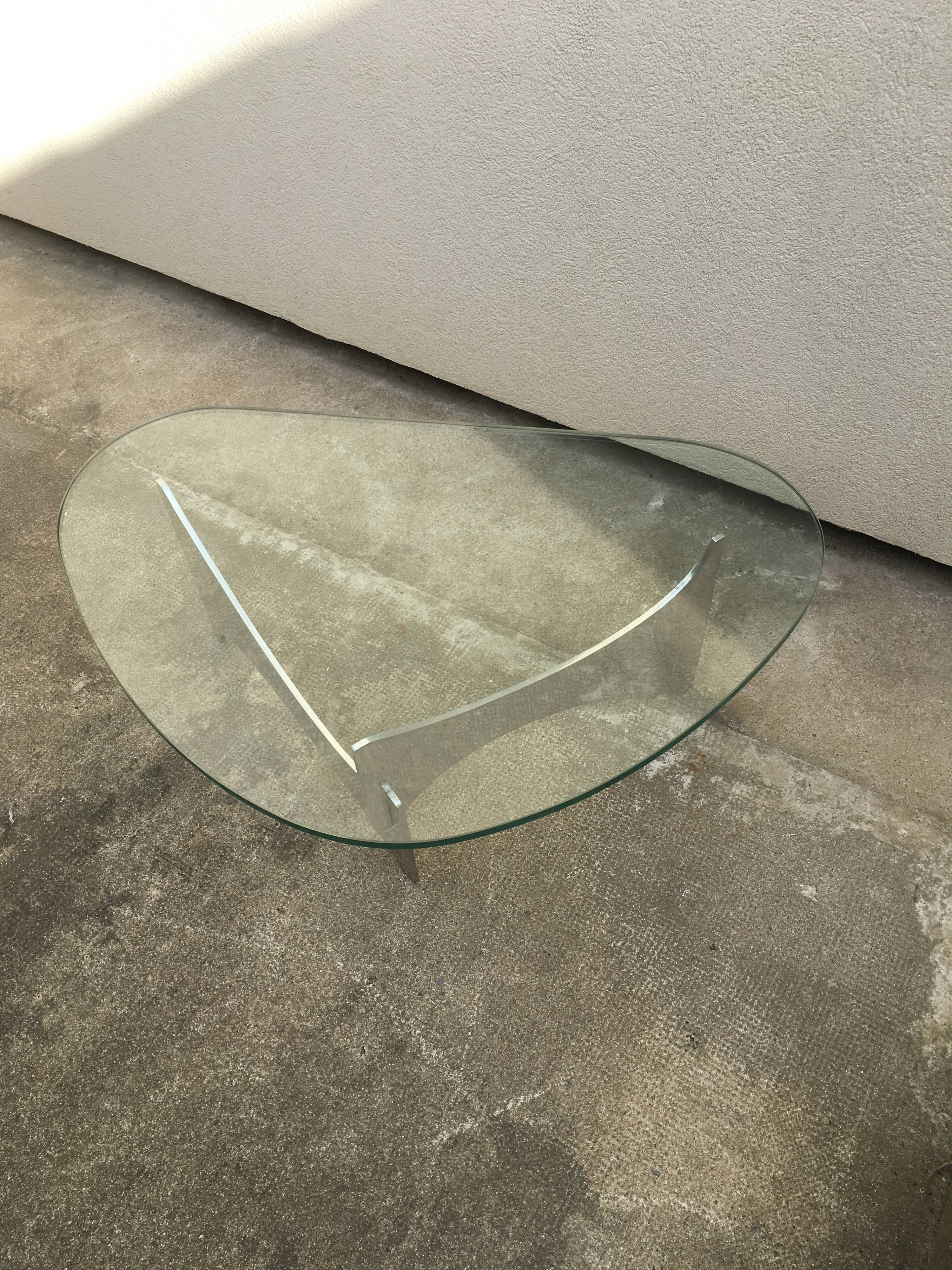 Glass and metal coffee table