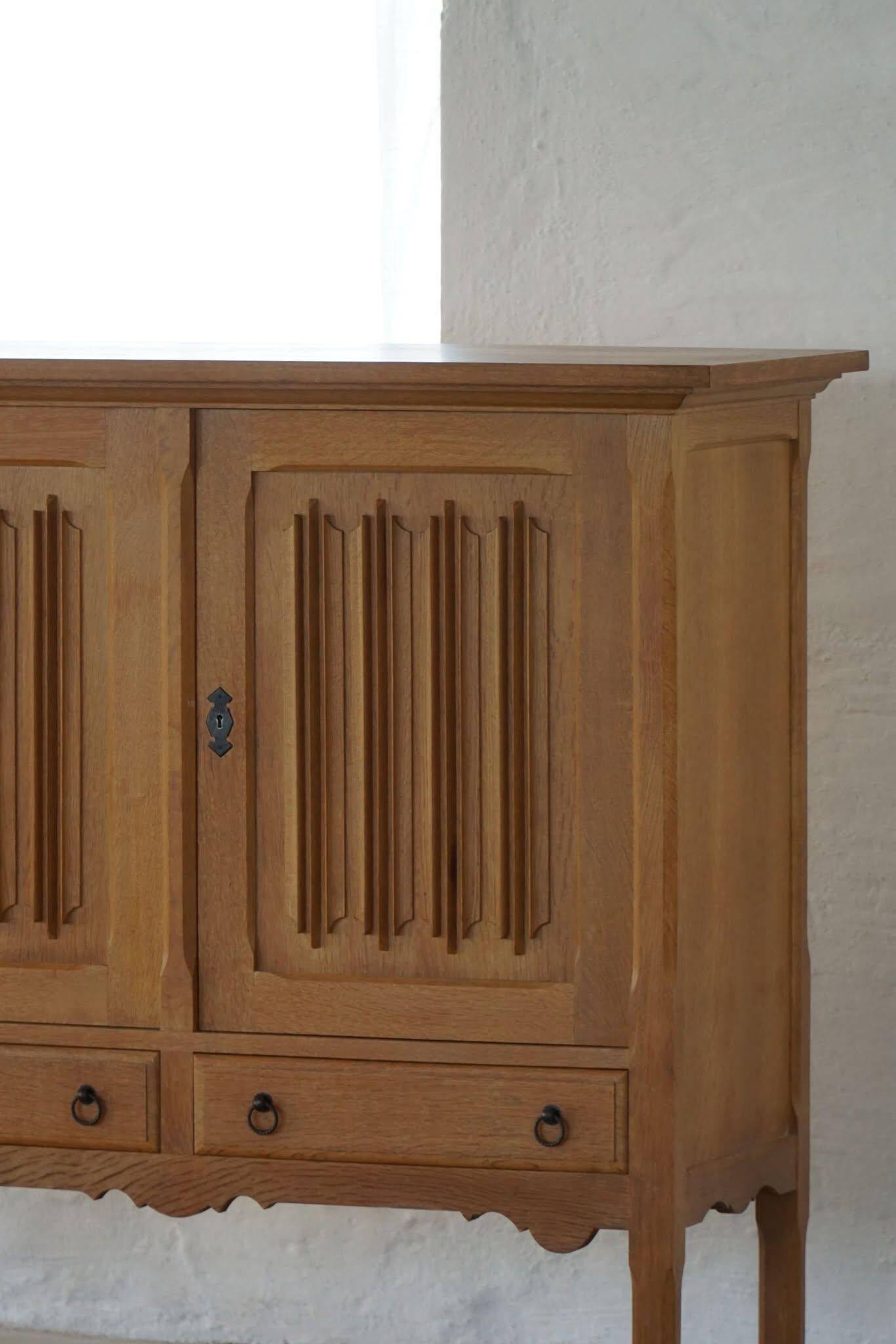 Brutalist oak sideboard, mid-century Danish design, Kjærnulf style, 1960s.