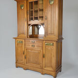 Art Nouveau oak buffet and dinanderie panels, circa 1910