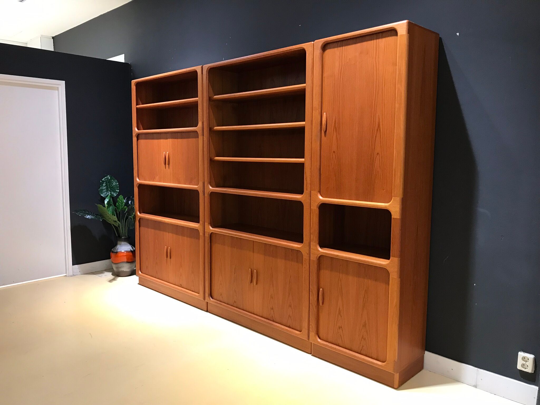 Teak wall system by Niels Bach for Dyrlund, 1970