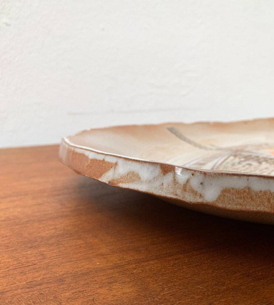 Large German ceramic plate with fish from the mid-century.