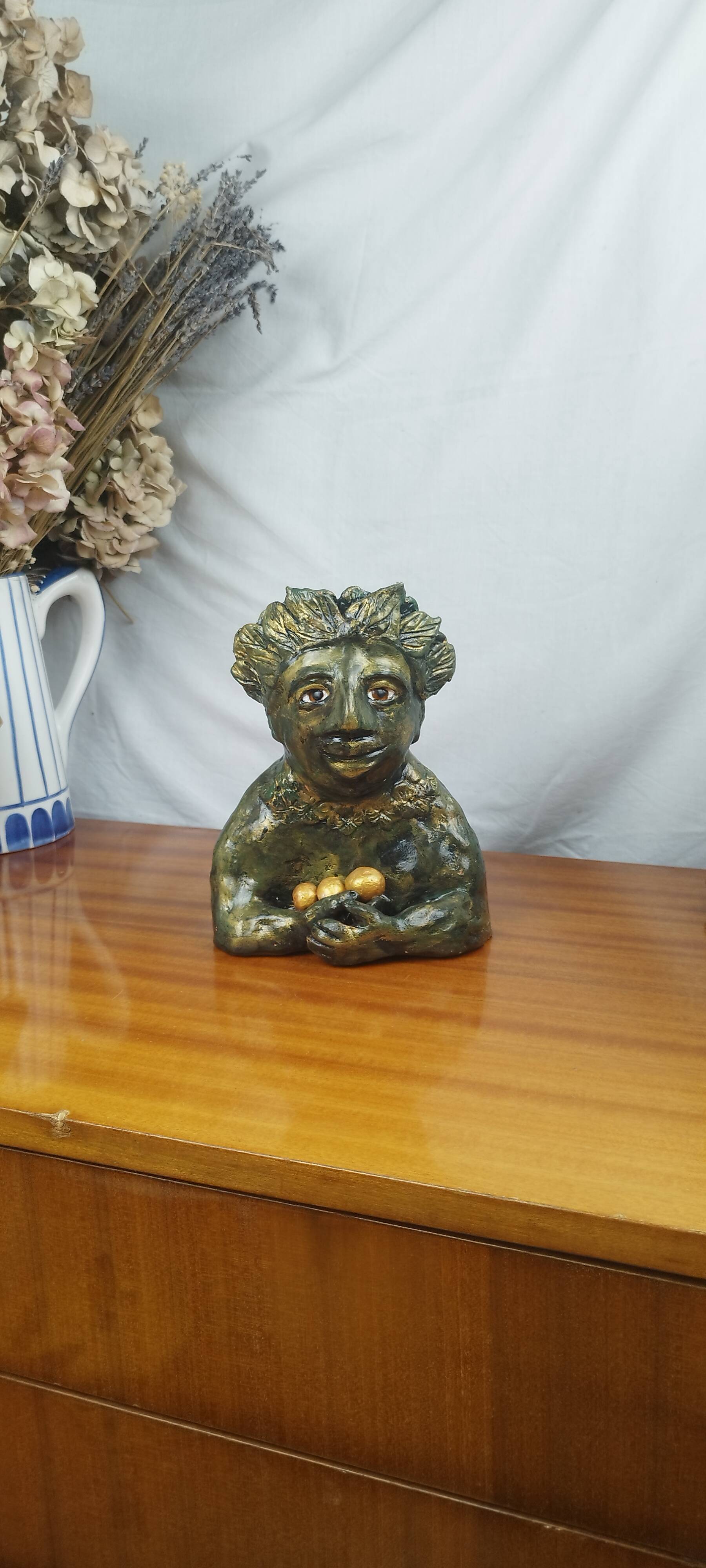 Clay sculpture of mother nature holding eggs, vintage modern figurative art