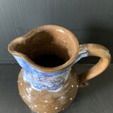 Brown enamelled ceramic pitcher with polka dots