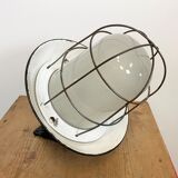 Industrial black enamel and cast iron wall lamp with iron grid, 1960s