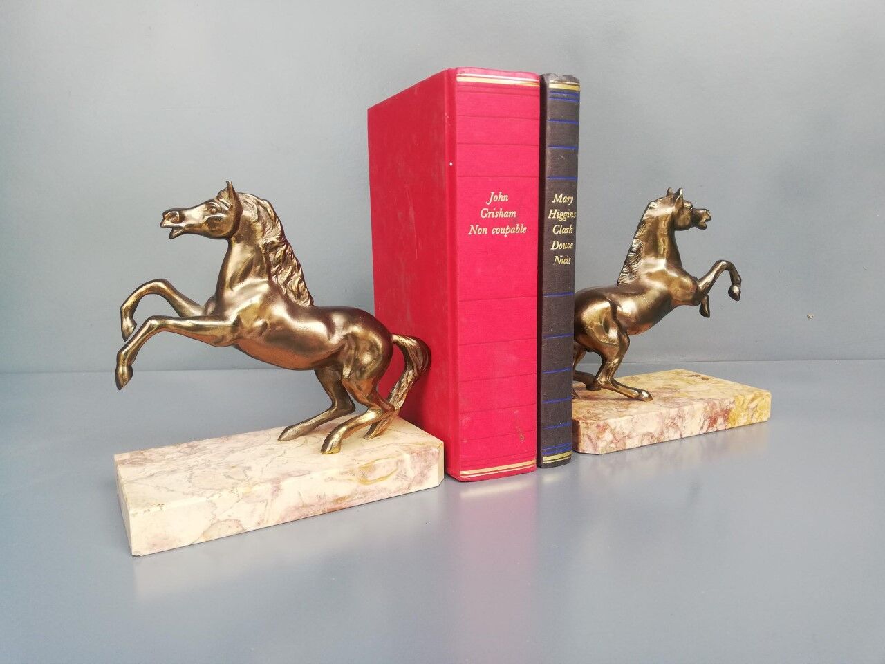 Pair of art deco bookends in bronze and marble