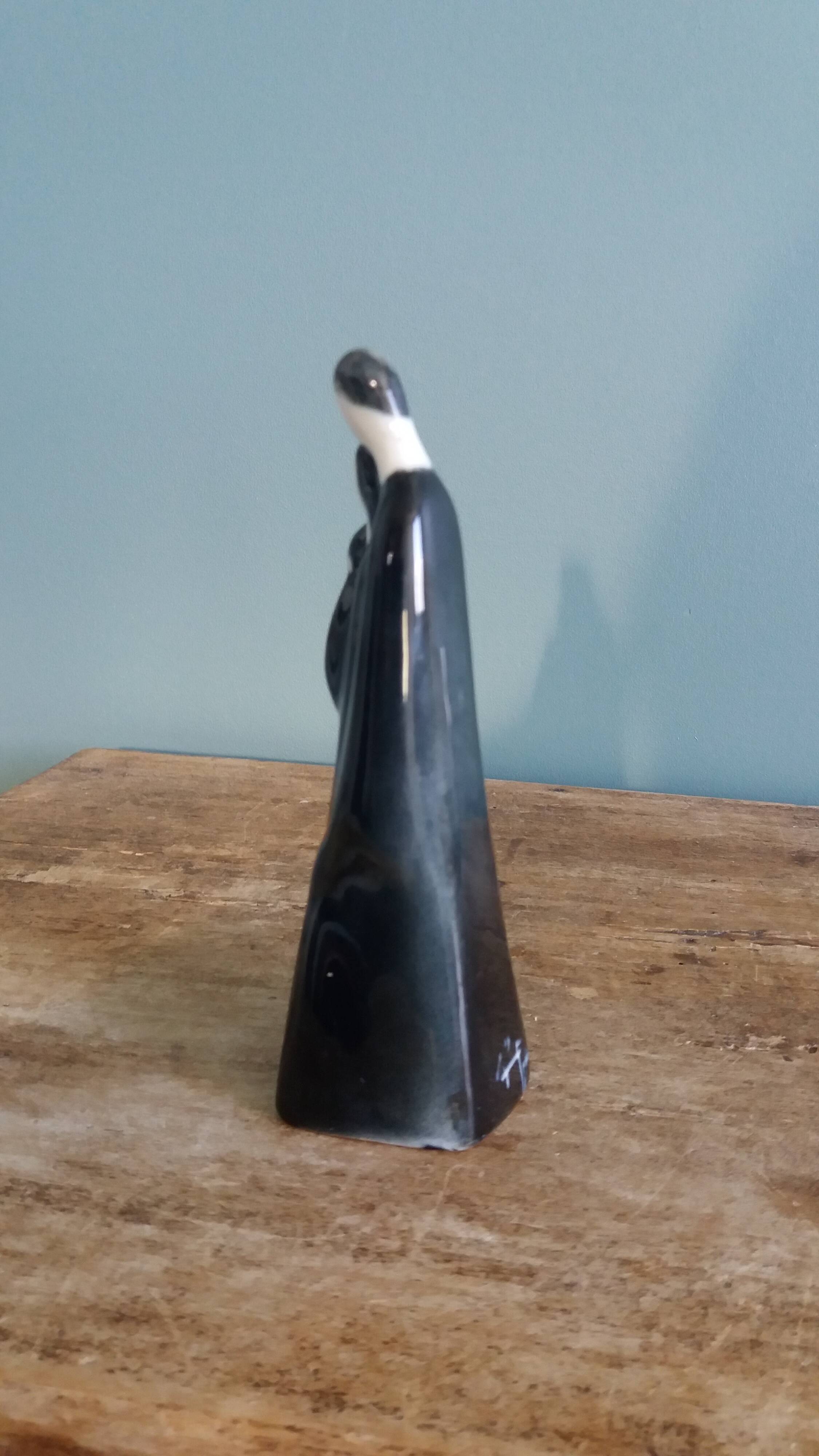 Porcelain sculpture signed Hassan Heshmat, Egypt