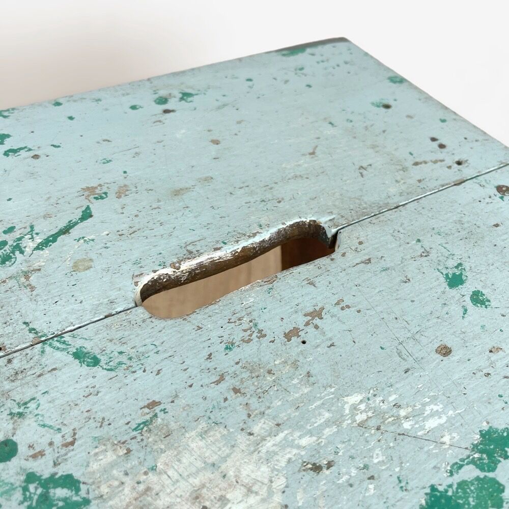 Old wooden slot stool