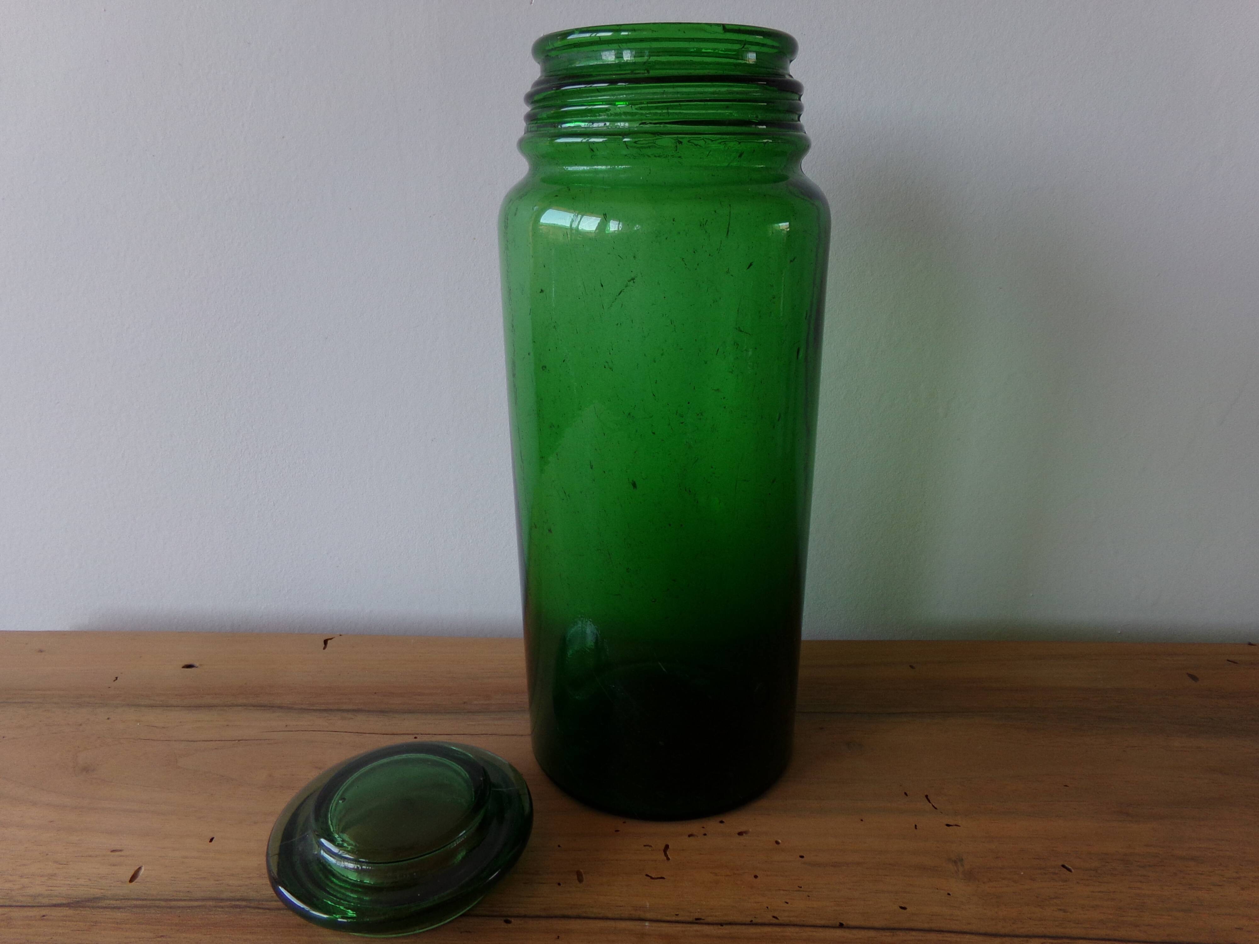 Antique green glass jar