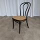 Chaise de salle à manger vintage style Thonet en bois noir et assise en cannage 1970