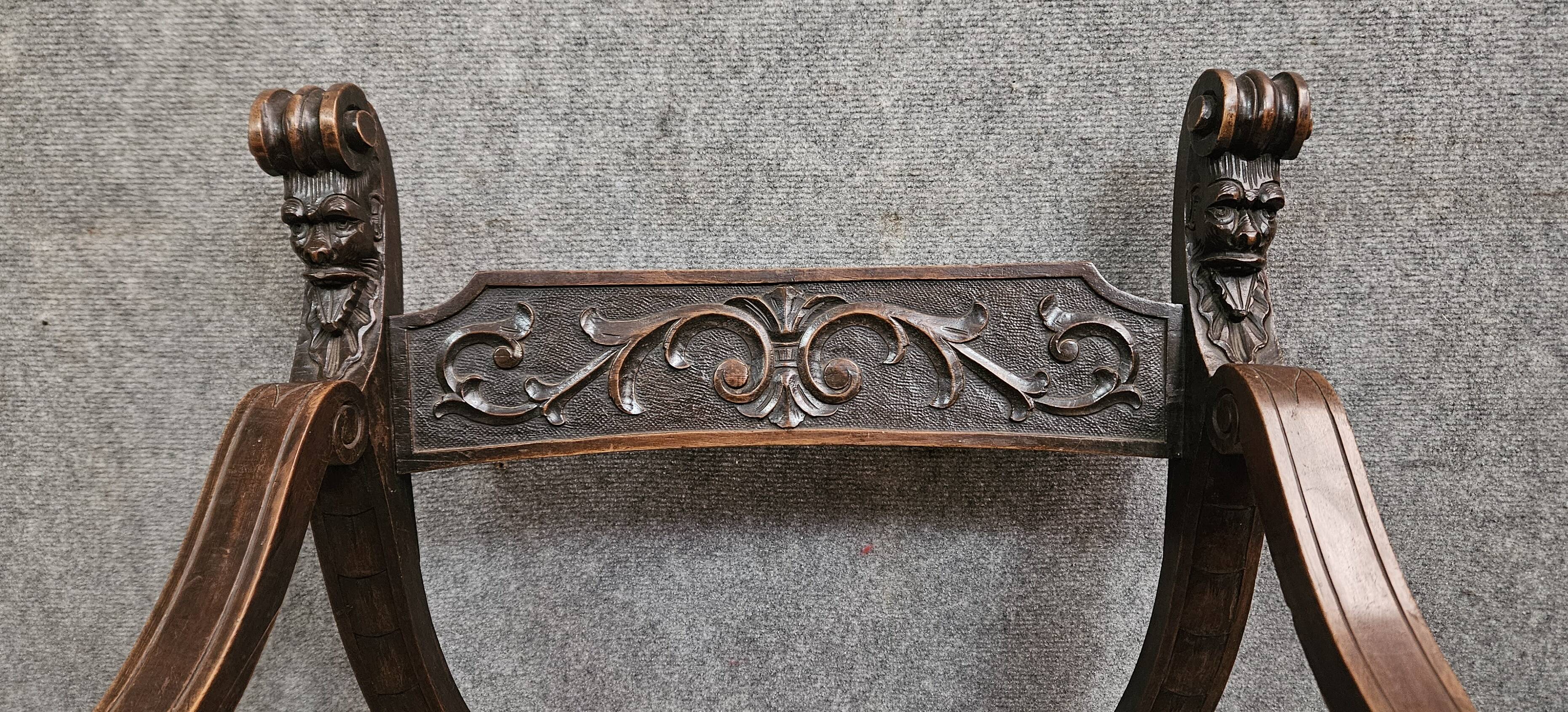 Antique curule chair in carved wood – Renaissance / Savonarole style