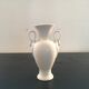 Vase blanc anses cygnes