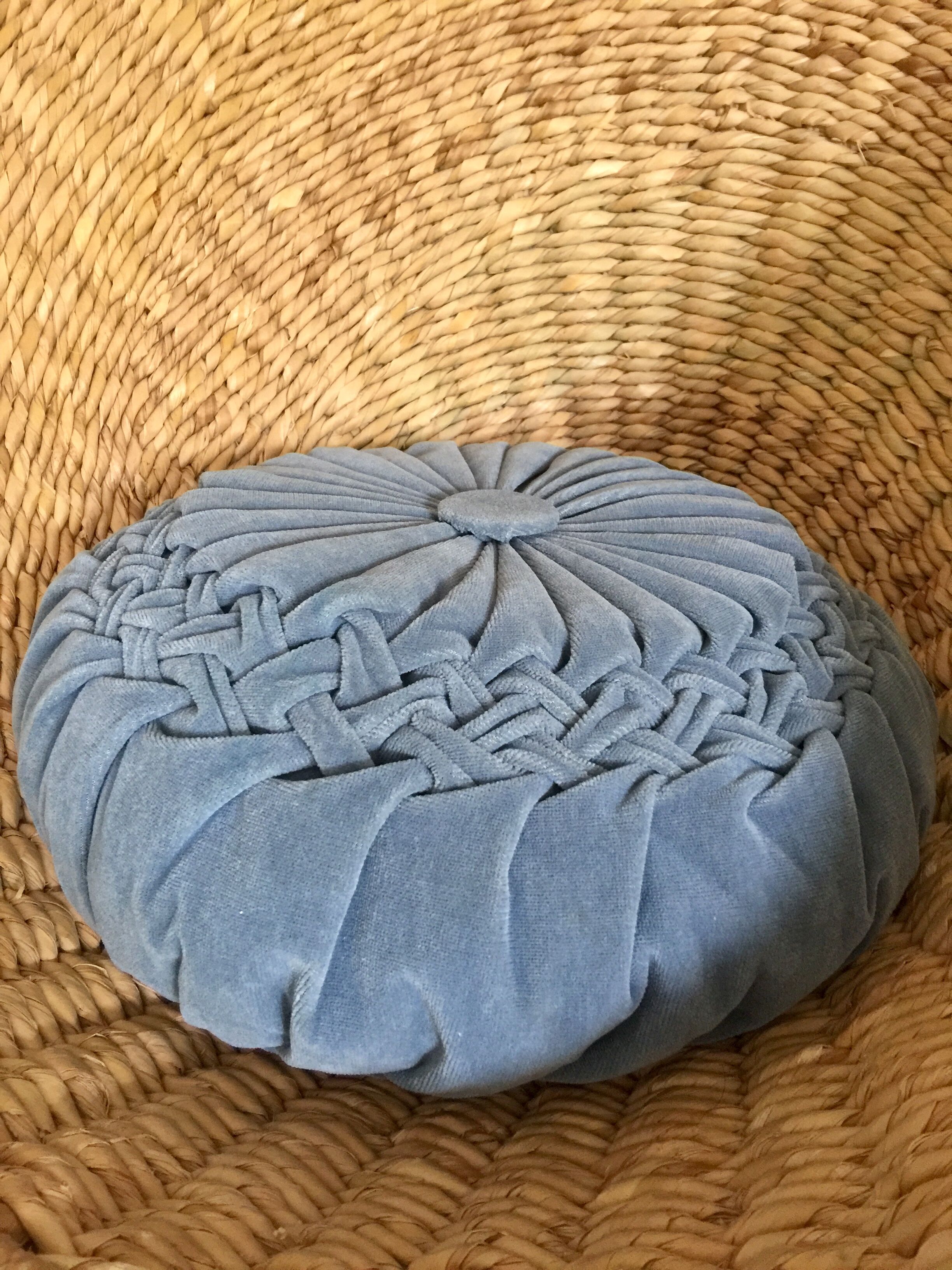 Blue pleated round cushion