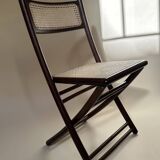 Set de quatre chaises pliantes en bois et cannage