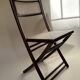 Set de quatre chaises pliantes en bois et cannage