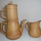 Old coffee maker and sandstone pitcher