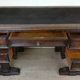 Unusual Renaissance style center desk made in the mid-19th century in walnut