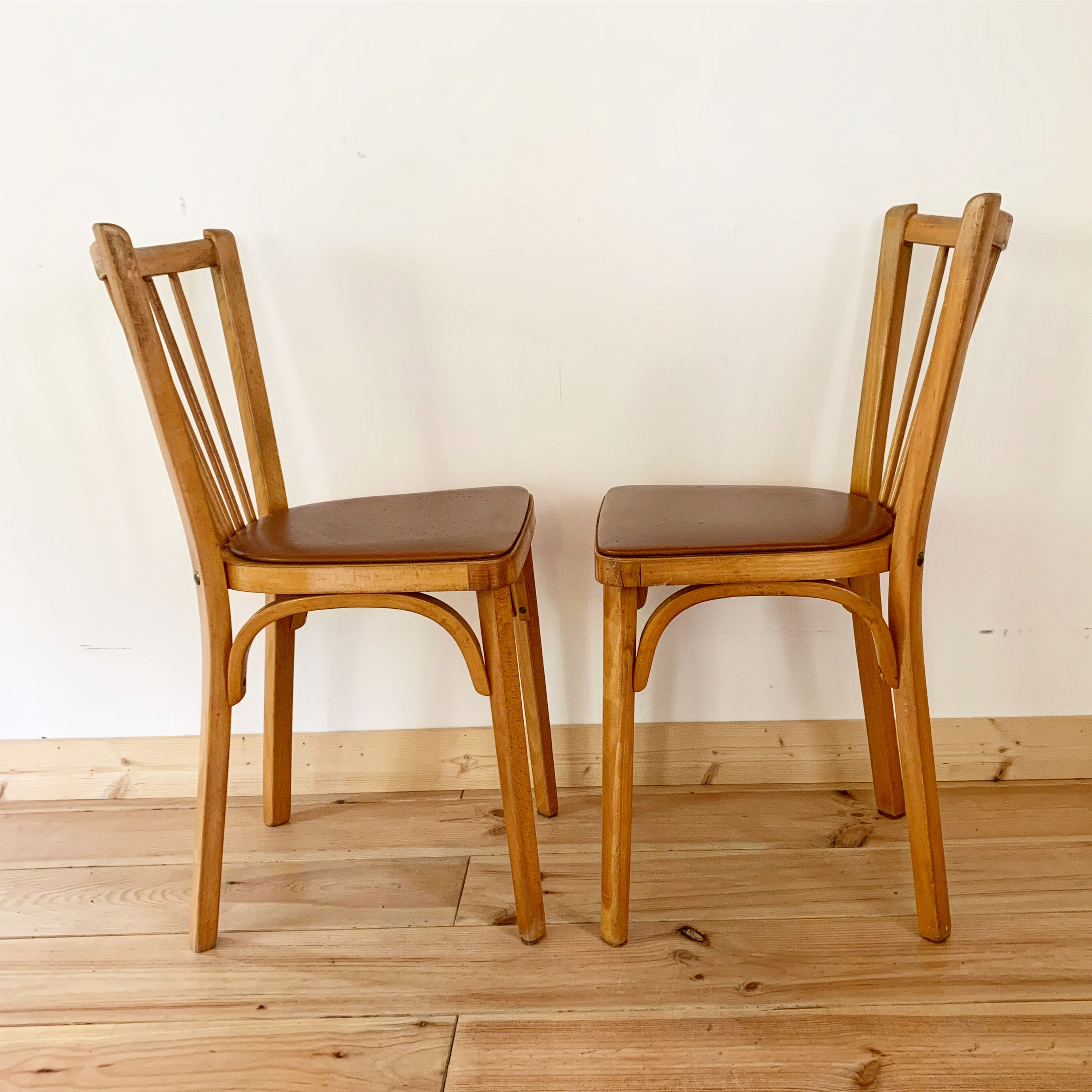 Pair of Baumann bistro chairs