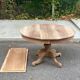Round dining table with central leg extendable in solid oak from the 18th century 210