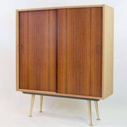 Wardrobe with sliding doors by Deutsche Werkstätten München