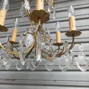 Remarkable cage chandelier with 6 lights and complete crystal pendants in working condition.