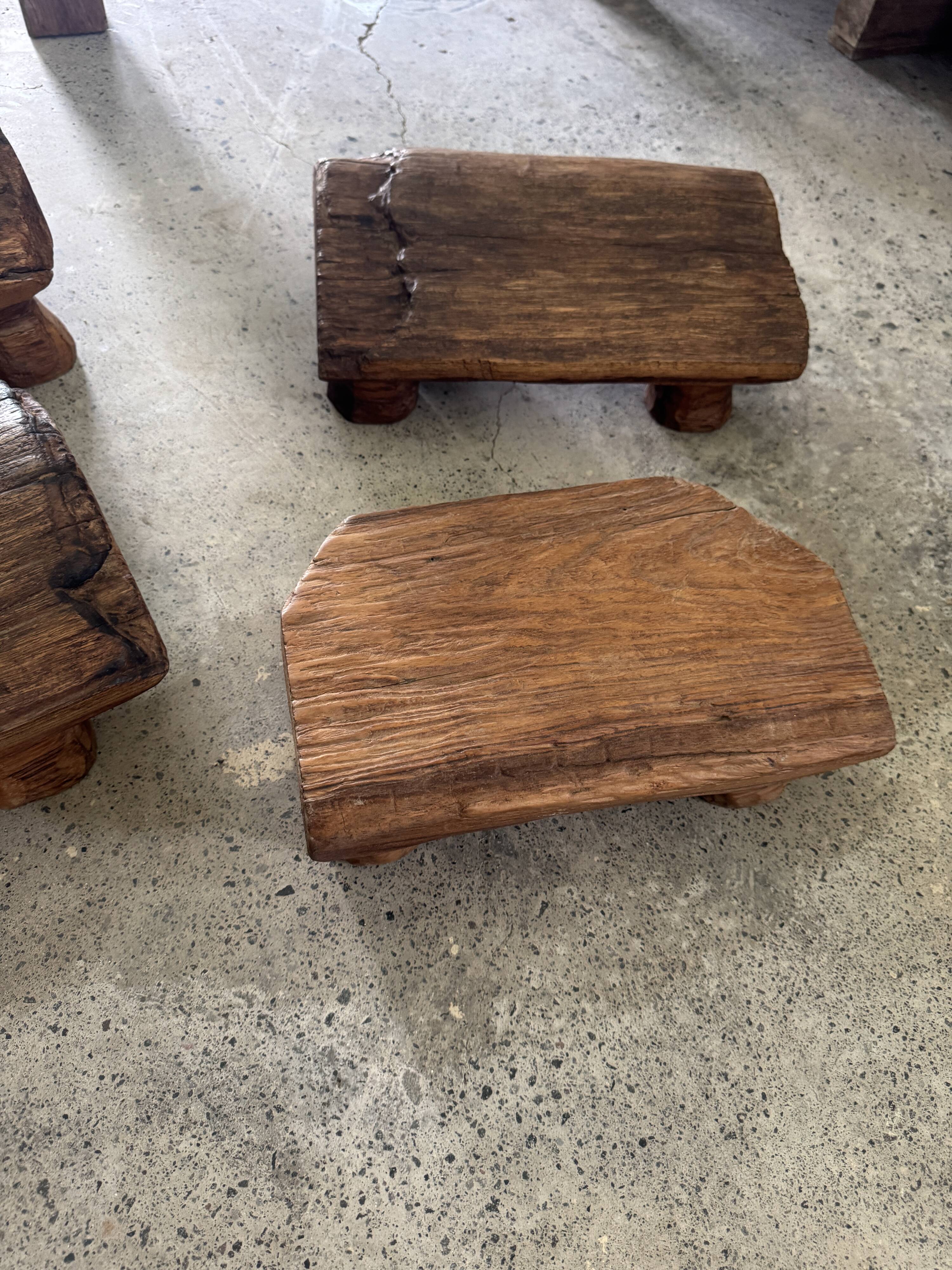 Small stool, teak footrest with short cut corners.
