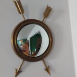 Curved brass witch's mirror