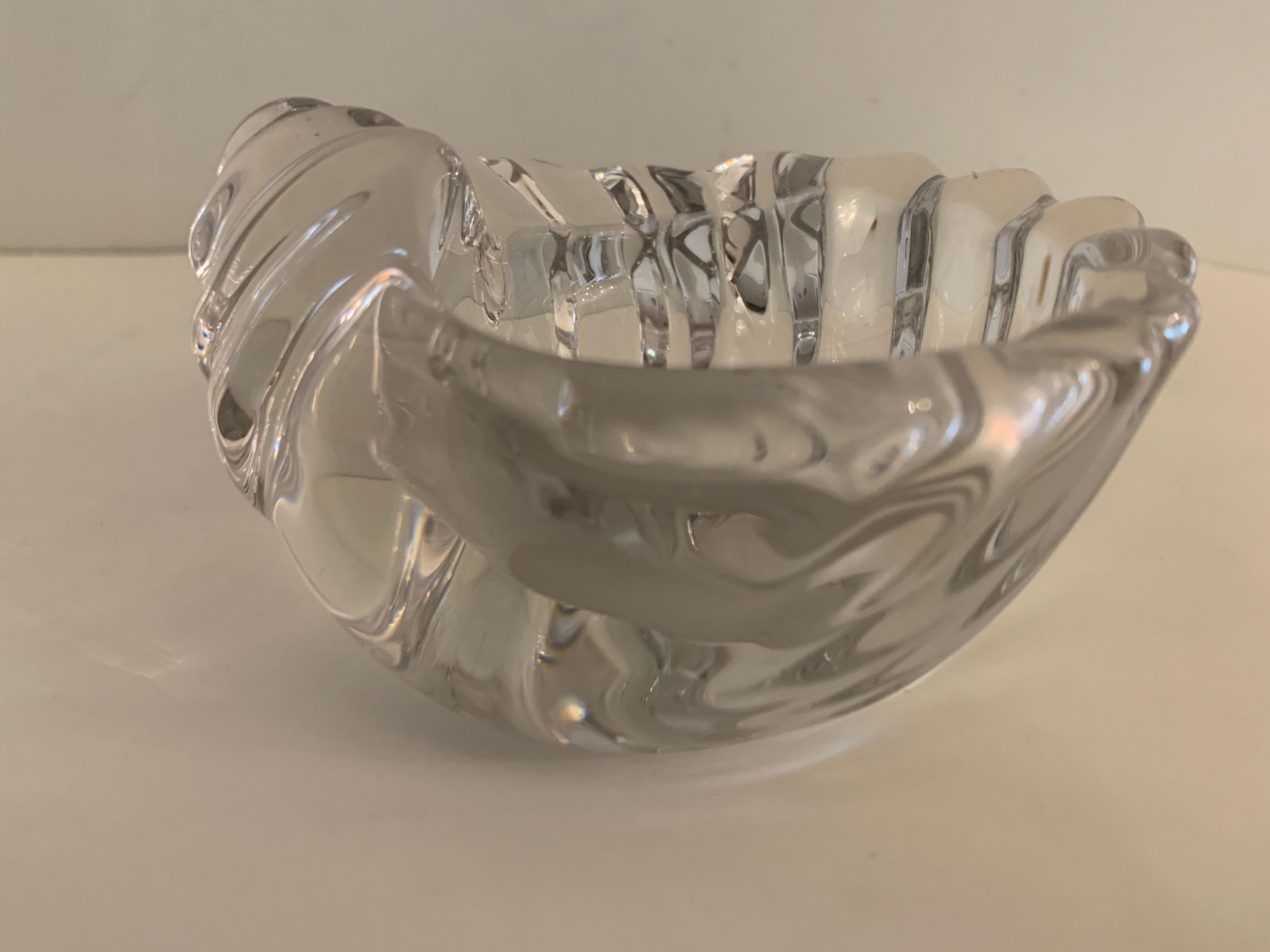 Empty crystal pocket in the shape of a shell