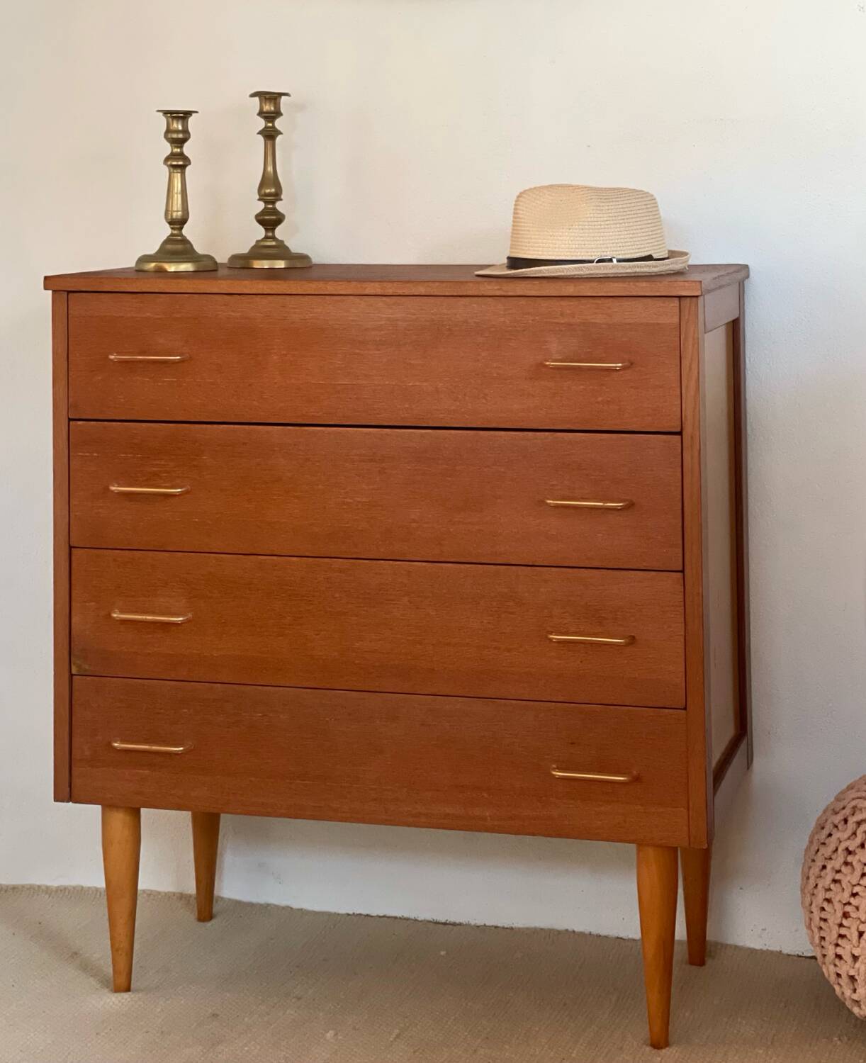 Vintage 1960s chest of drawers with covered handles.