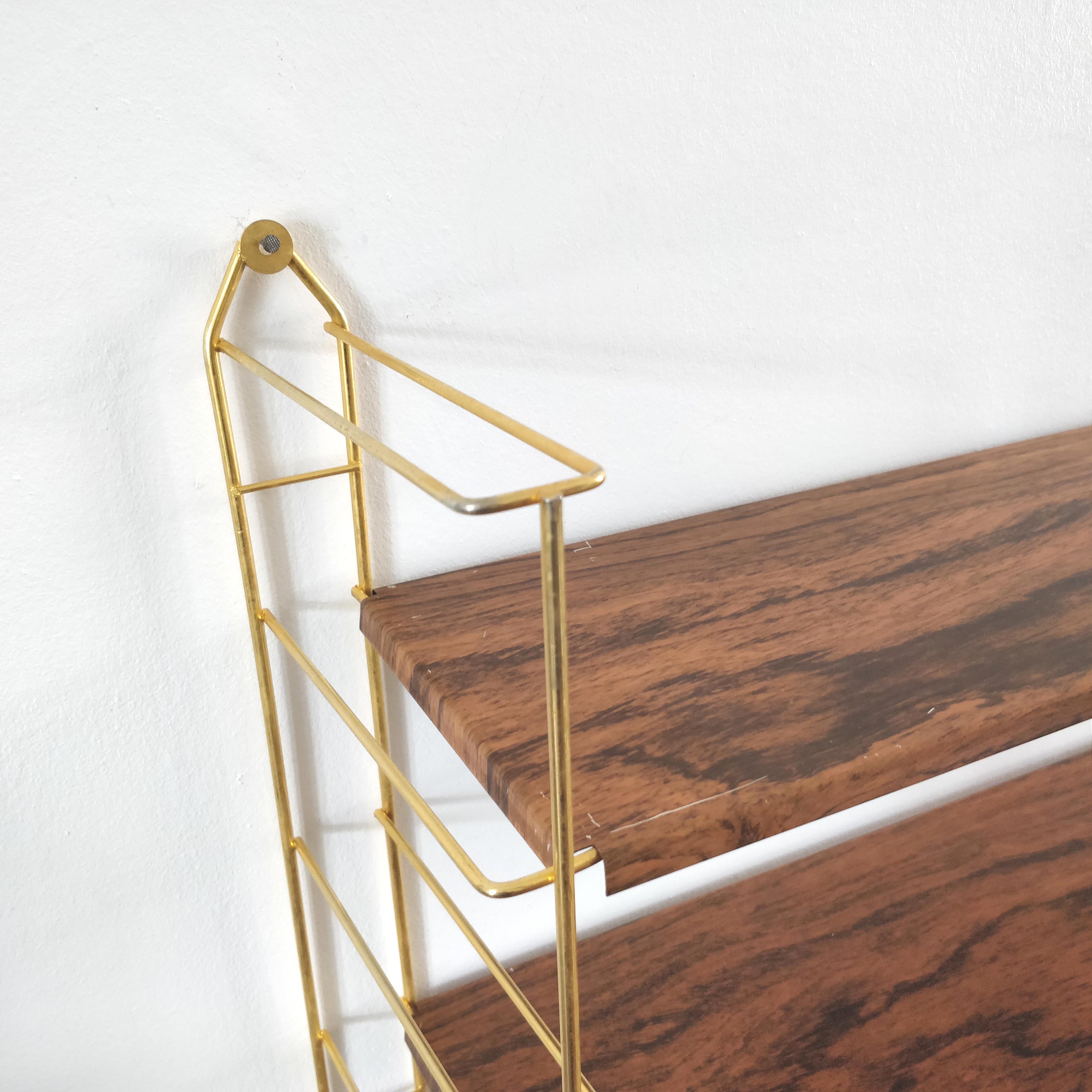 Wood-coloured metal string shelf and gold double studs 1960