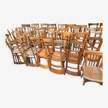 Set of 45 mismatched wooden bistro chairs