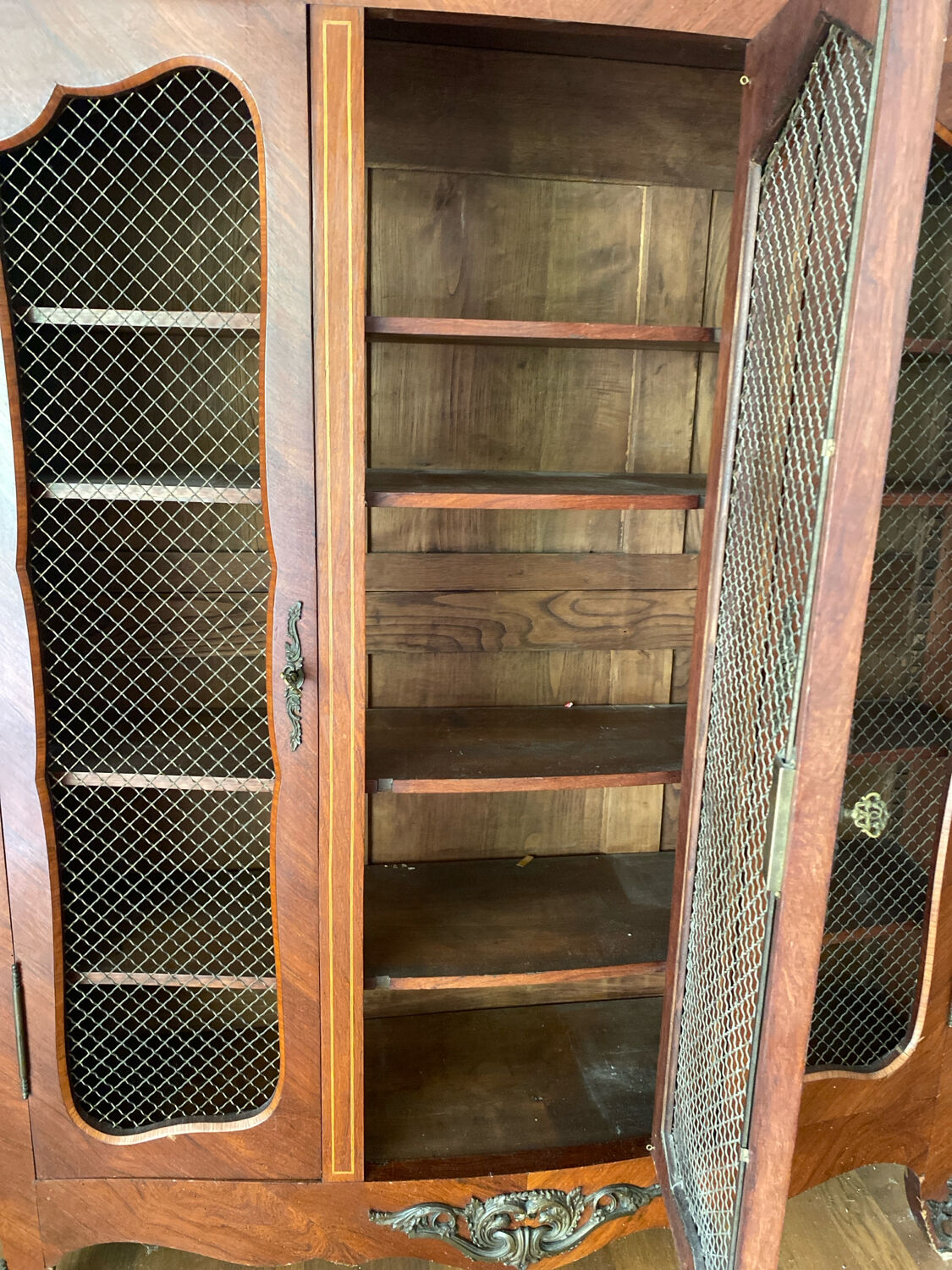 Wire mesh and wood bookshelf