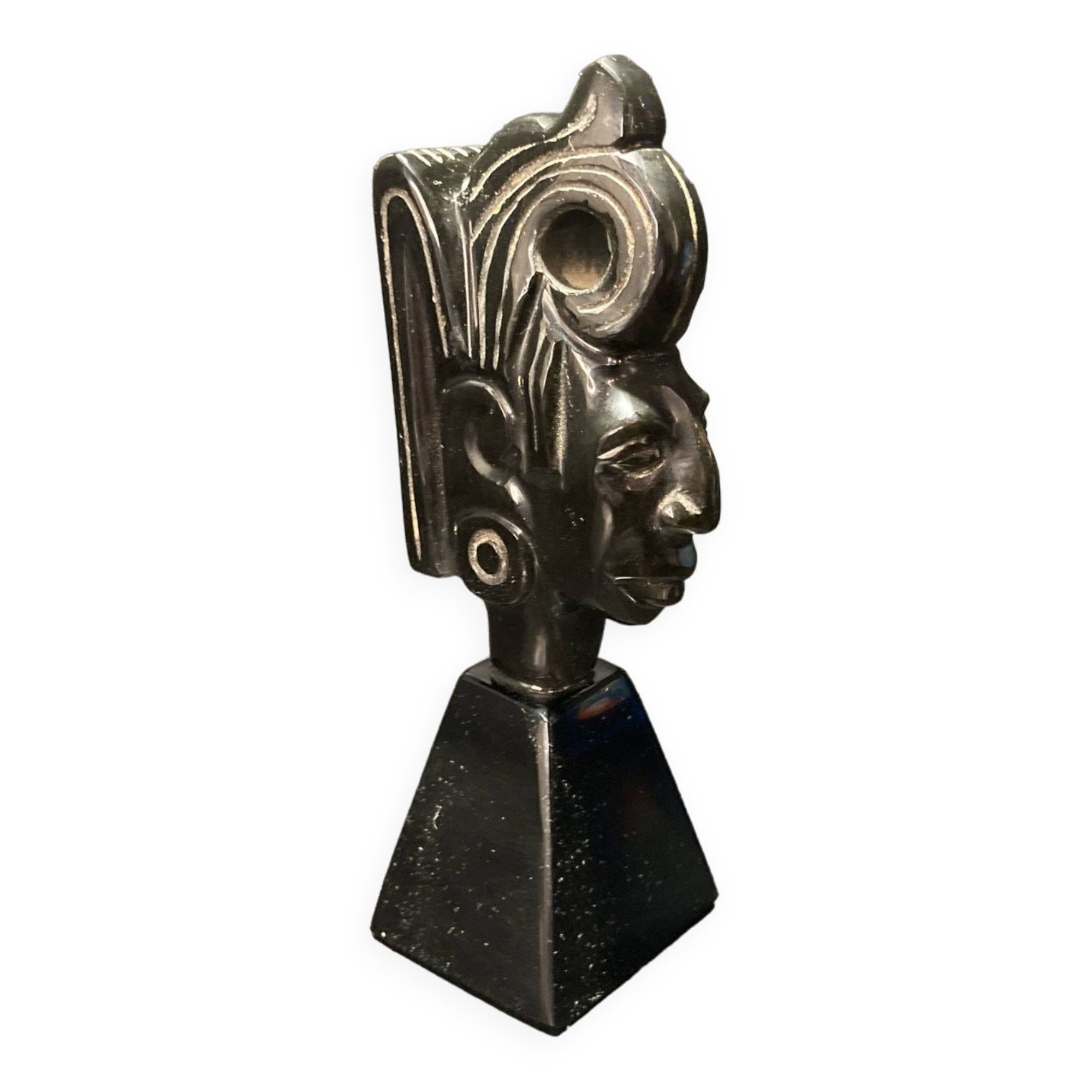 Ceramic sculpture representing a woman's face placed on a black base