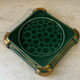 Art Deco bottle coaster in speckled green glazed ceramic and
