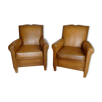 Paire de fauteuils club "modèle moustaches"
