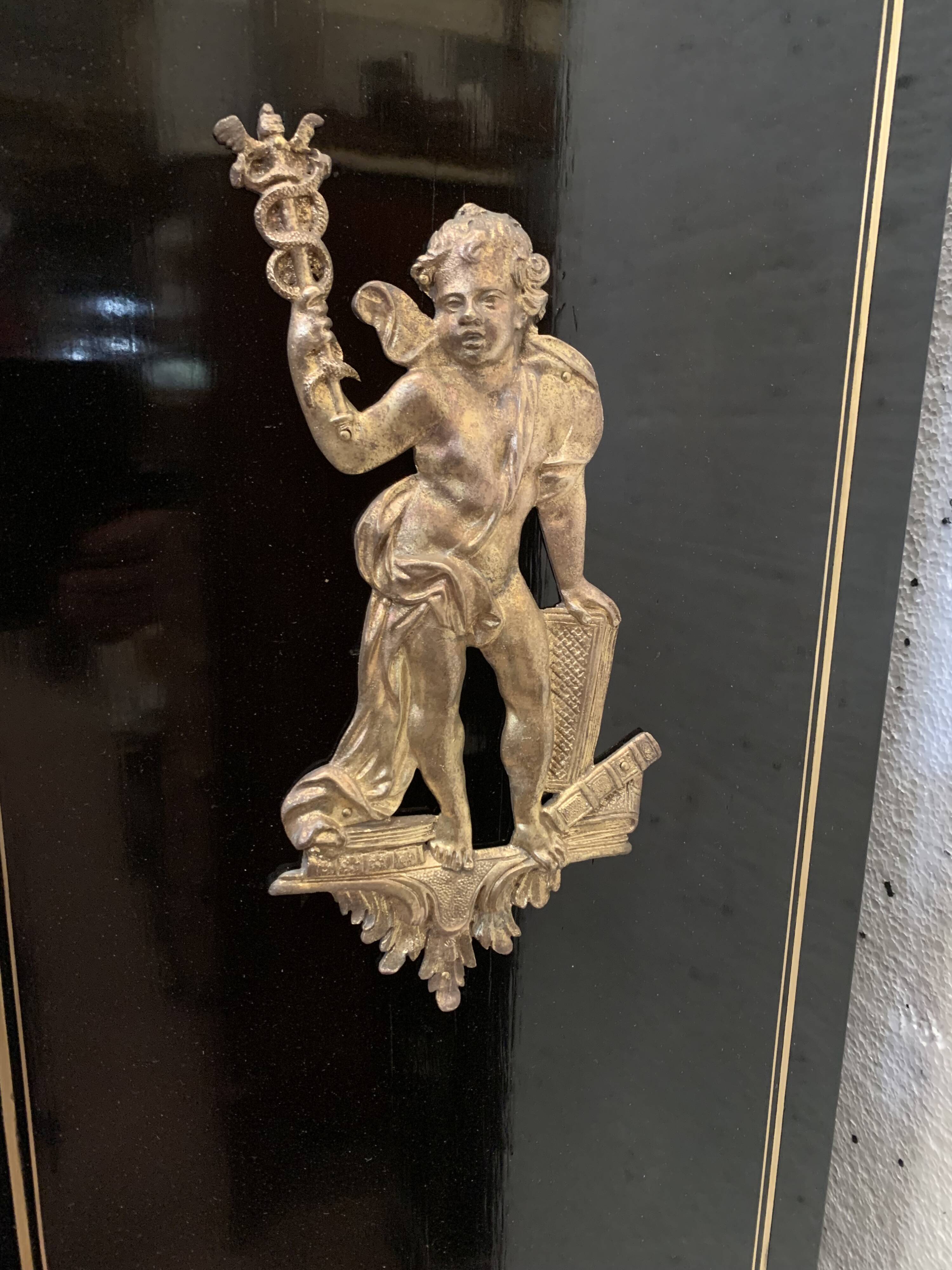 Napoleon III ceremonial showcase in black wood and gilded chiseled bronze XIX century