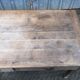 Antique solid cherry farm table with 3 front drawers.