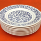8 flat earthenware plates with floral decoration made in italy