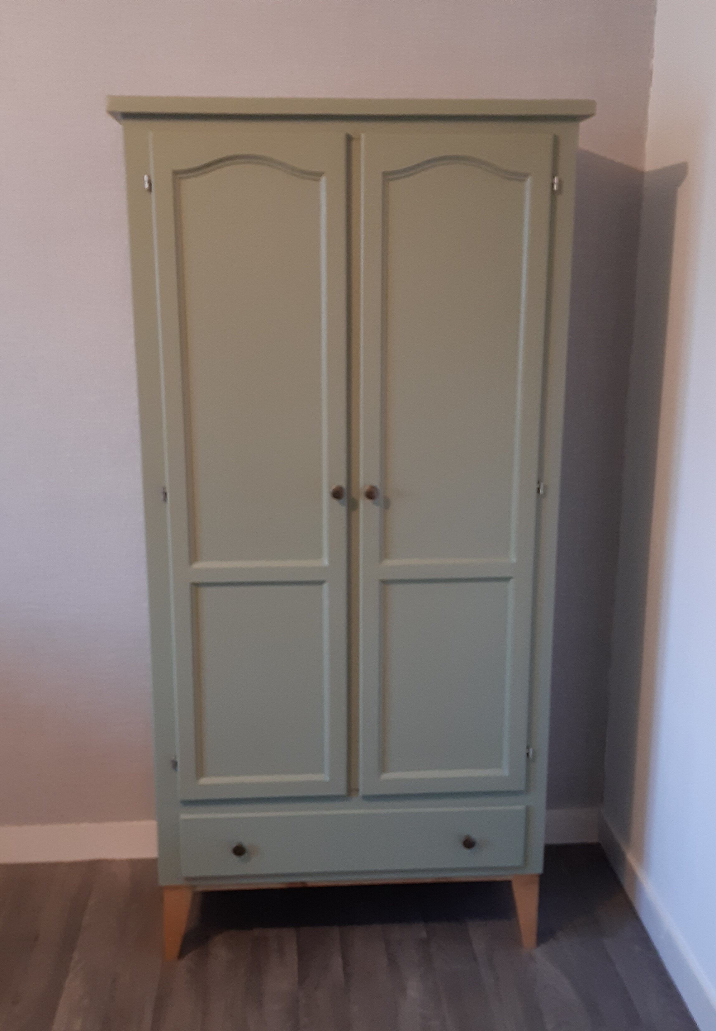 Scandinavian forest green wardrobe