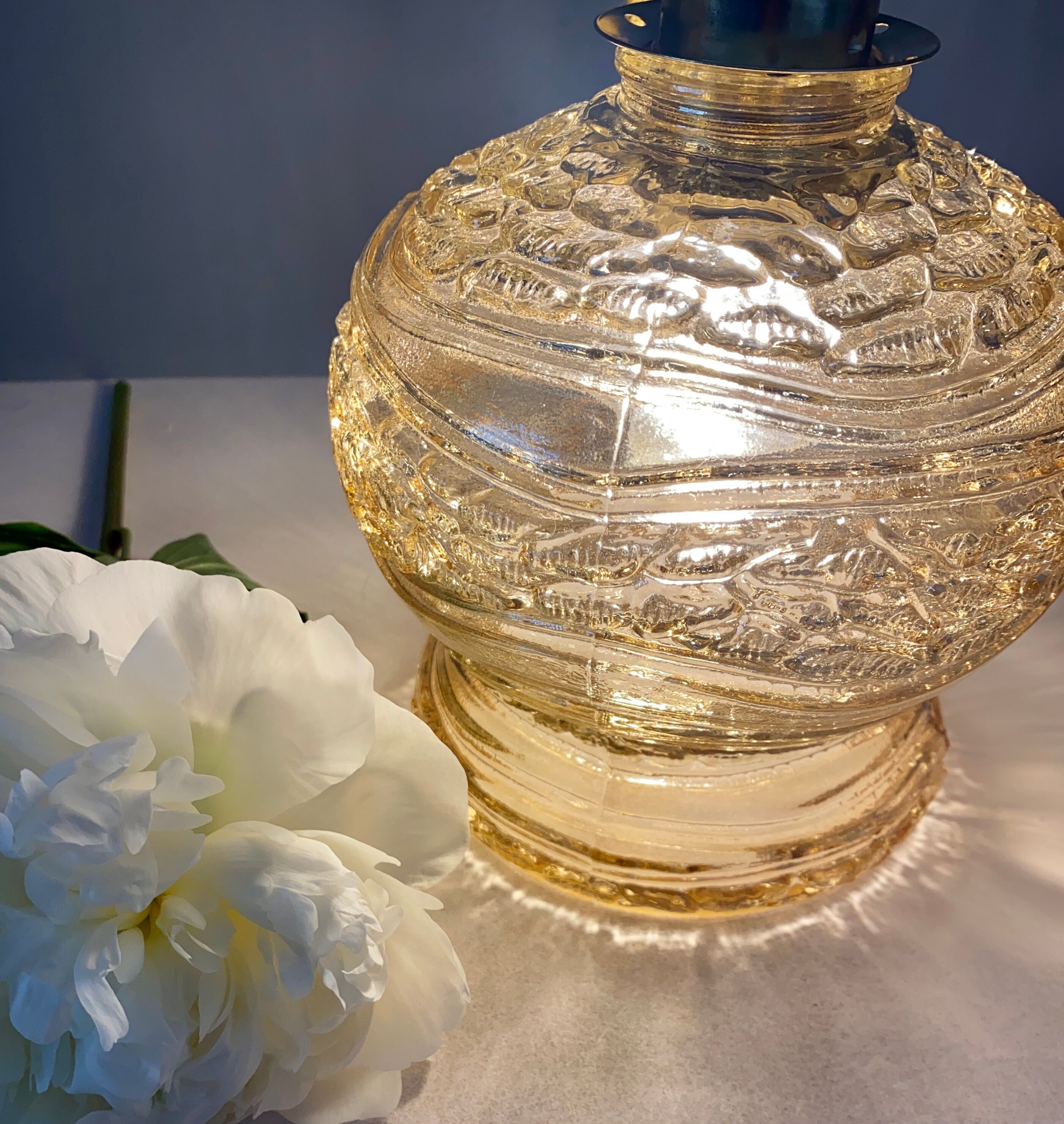 Vintage amber glass globe player