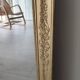 Wood and gilded stucco mirror, 19th century, 115 x 61.5 cm.