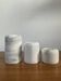 Trio de bougeoirs rouleaux vintage en marbre blanc