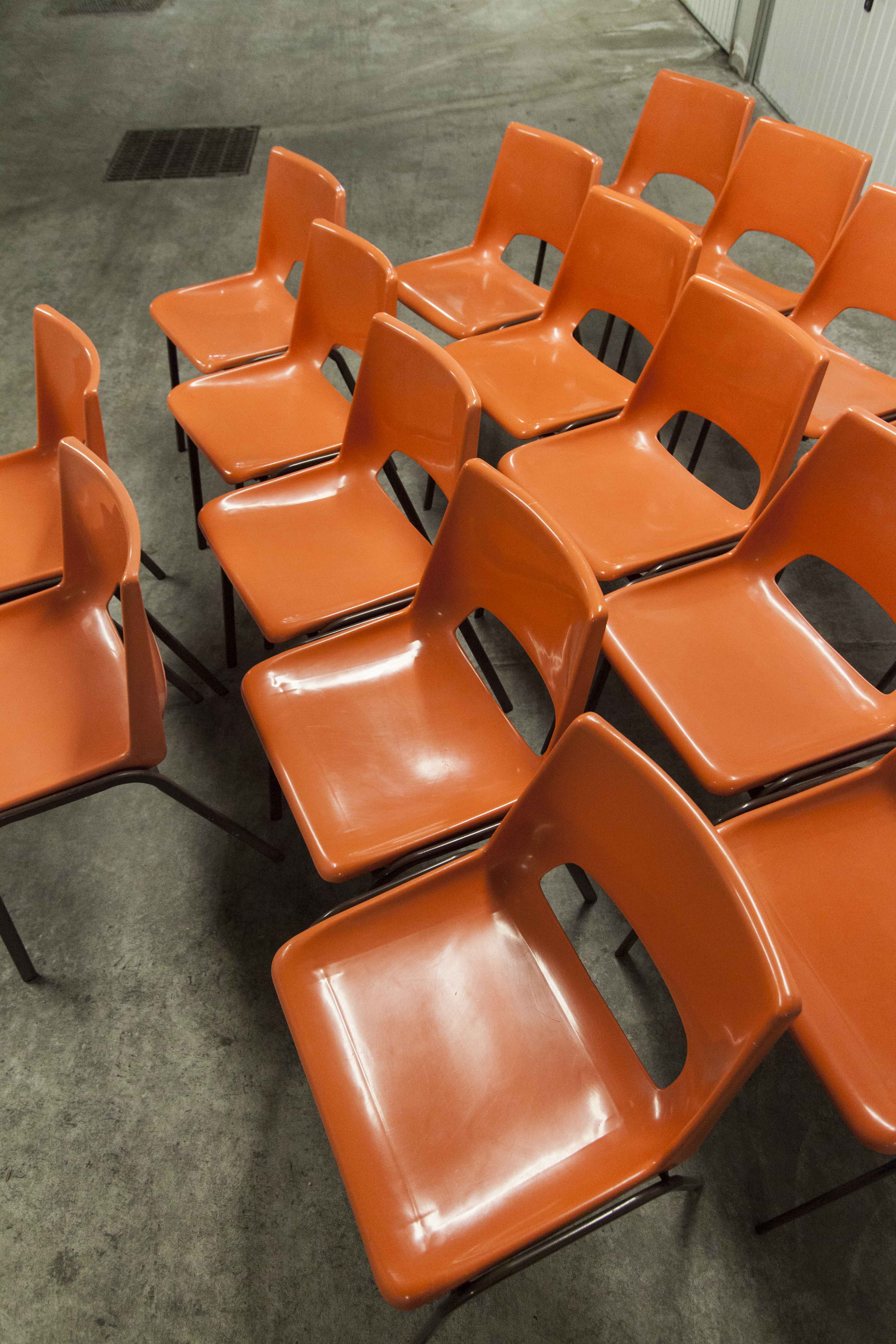 Set of 17 vintage orange chairs 1970