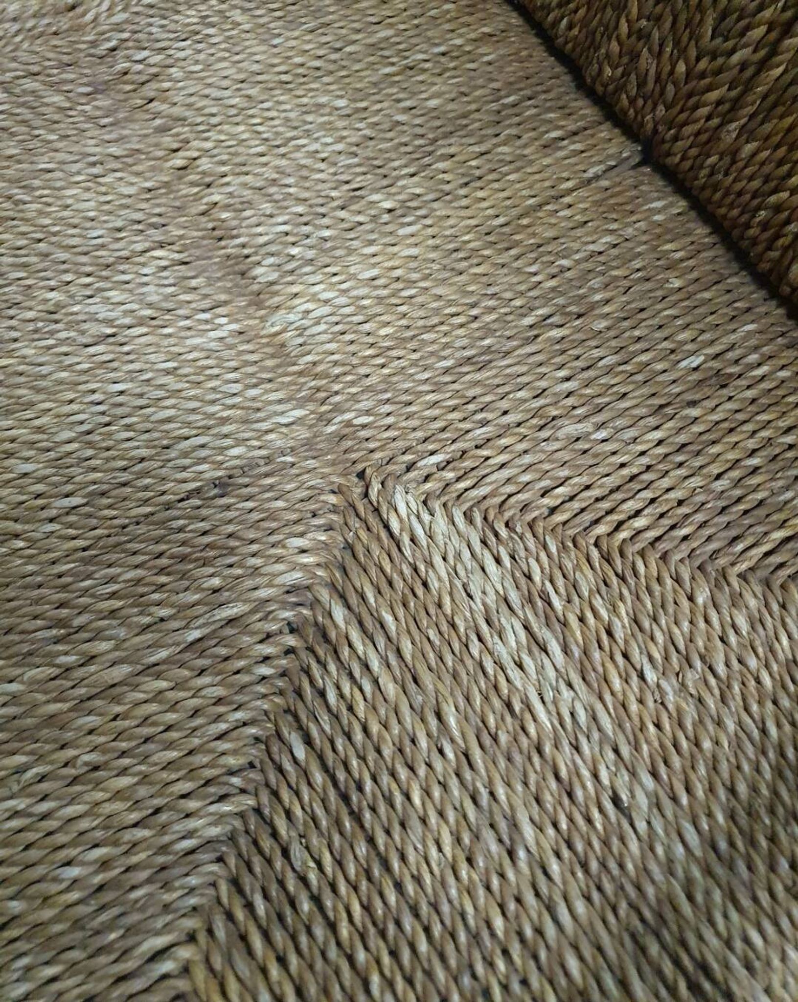 Vintage French papercord sofa with a metal frame base