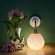 Vintage pink Clichy glass globe wall light.