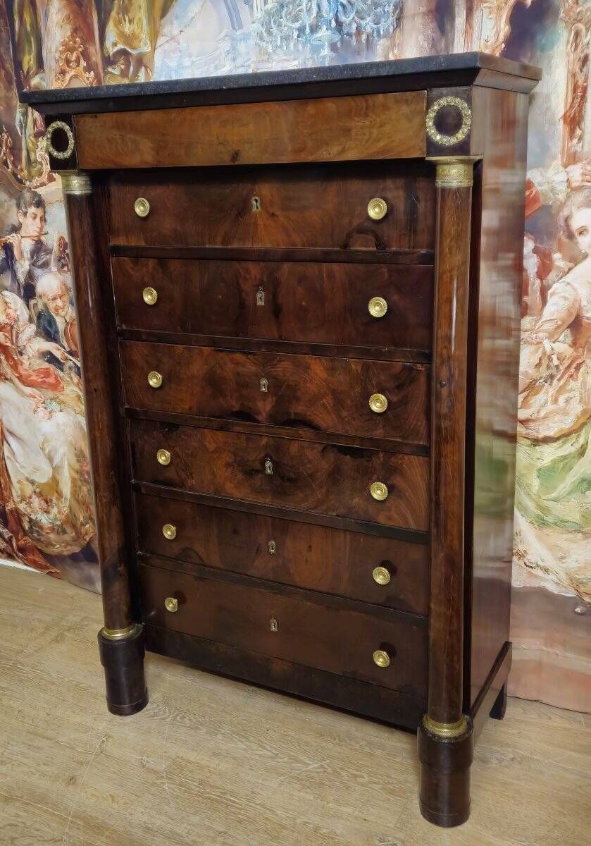Empire period chest of drawers, early 19th century, in flame mahogany.