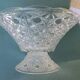 Flared fruit bowl with a pedestal, all made of pressed moulded glass, mid-20th century.